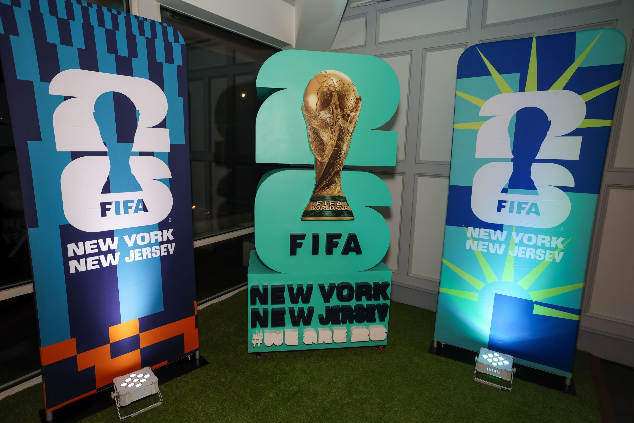 FIFA World Cup 2026 trophy display with New York New Jersey Stadium branding for Round of 32 Match 77